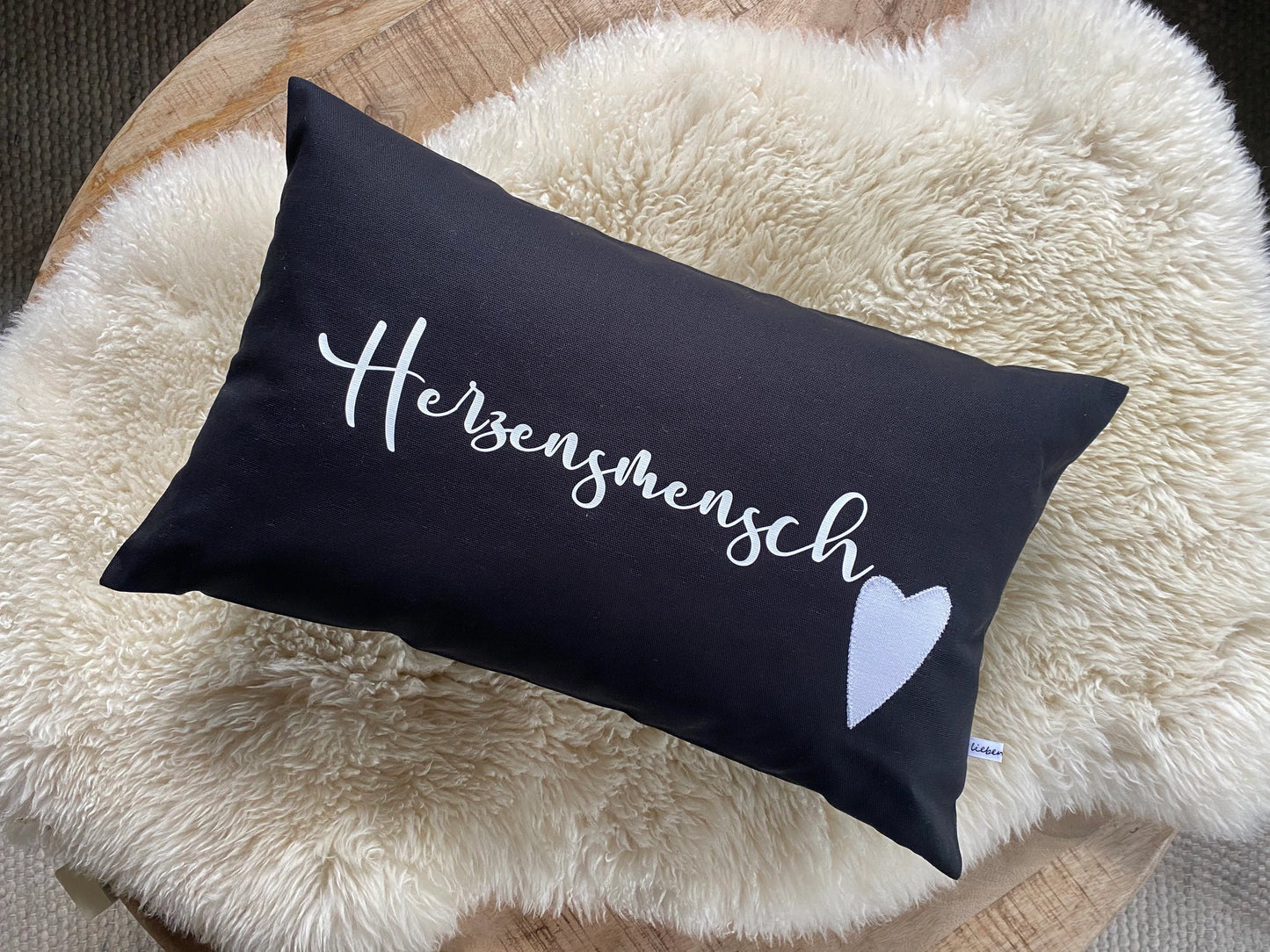 Kissen Herzensmensch schwarz