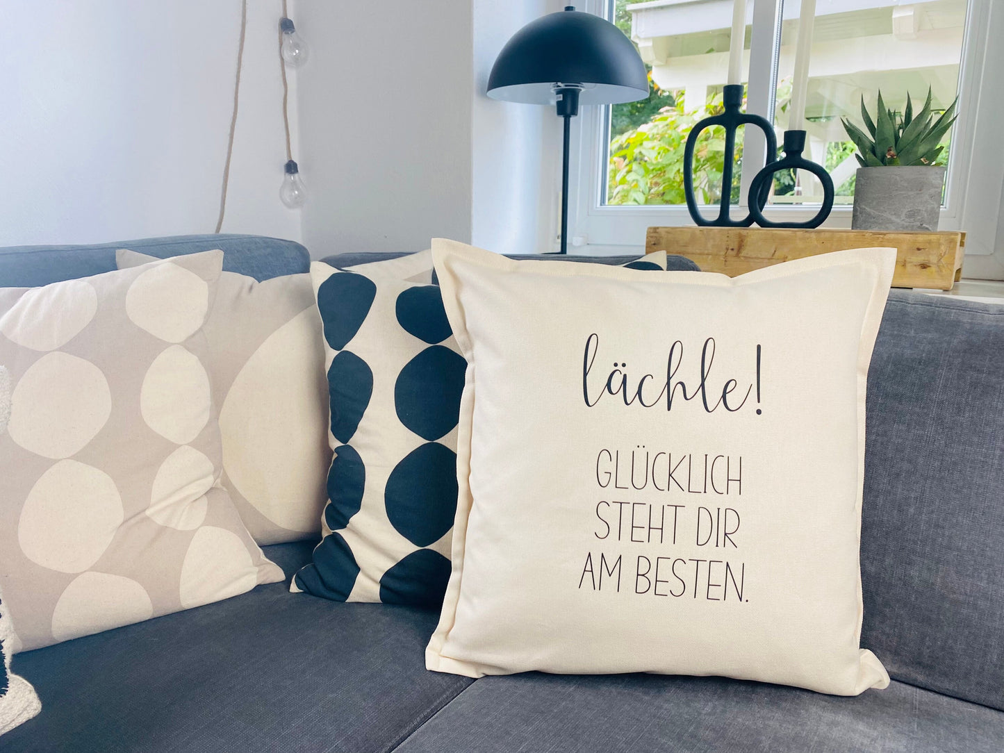 Kissen lächle cremeweiß