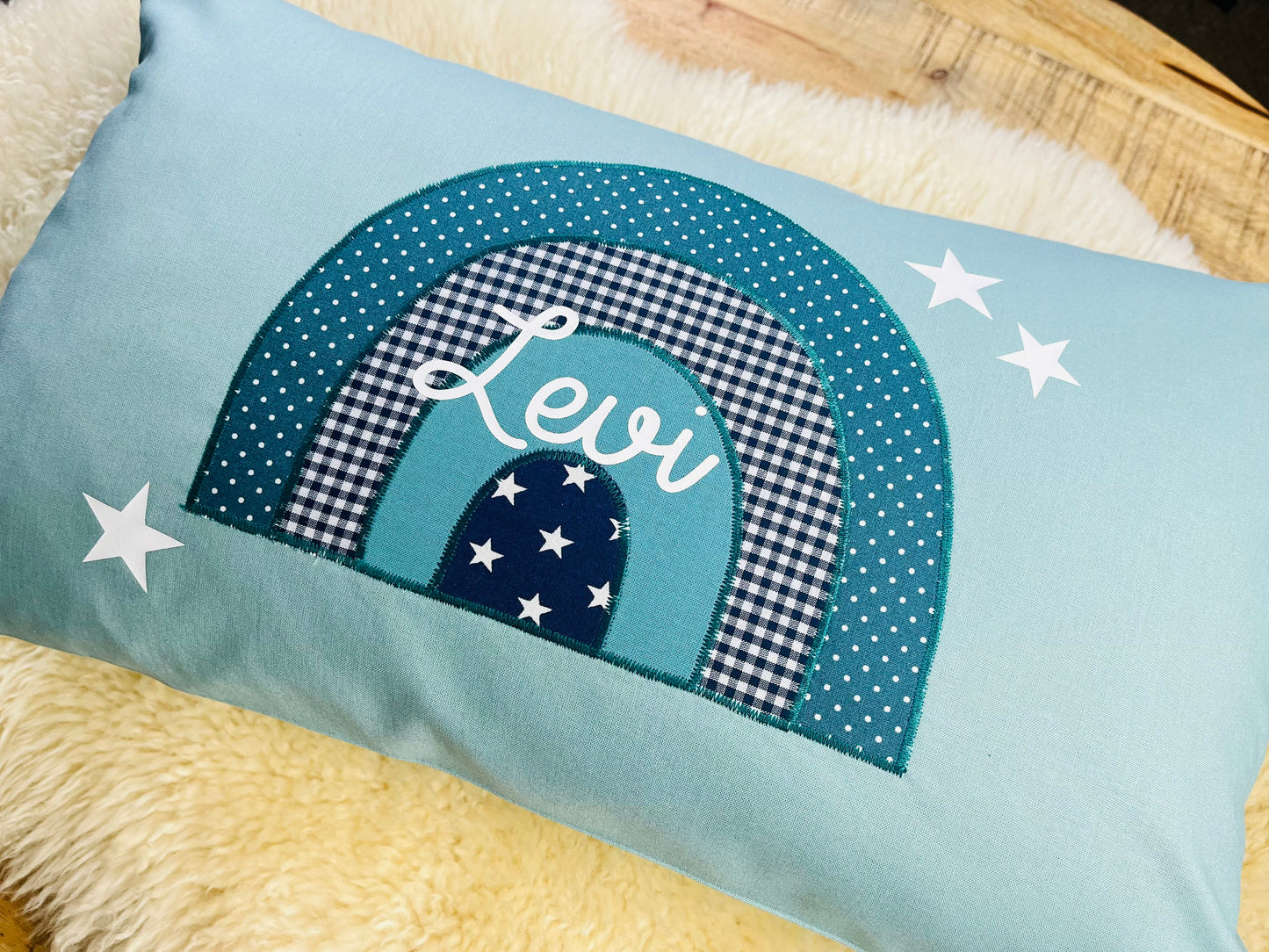Namenskissen Regenbogen personalisiert aqua blau