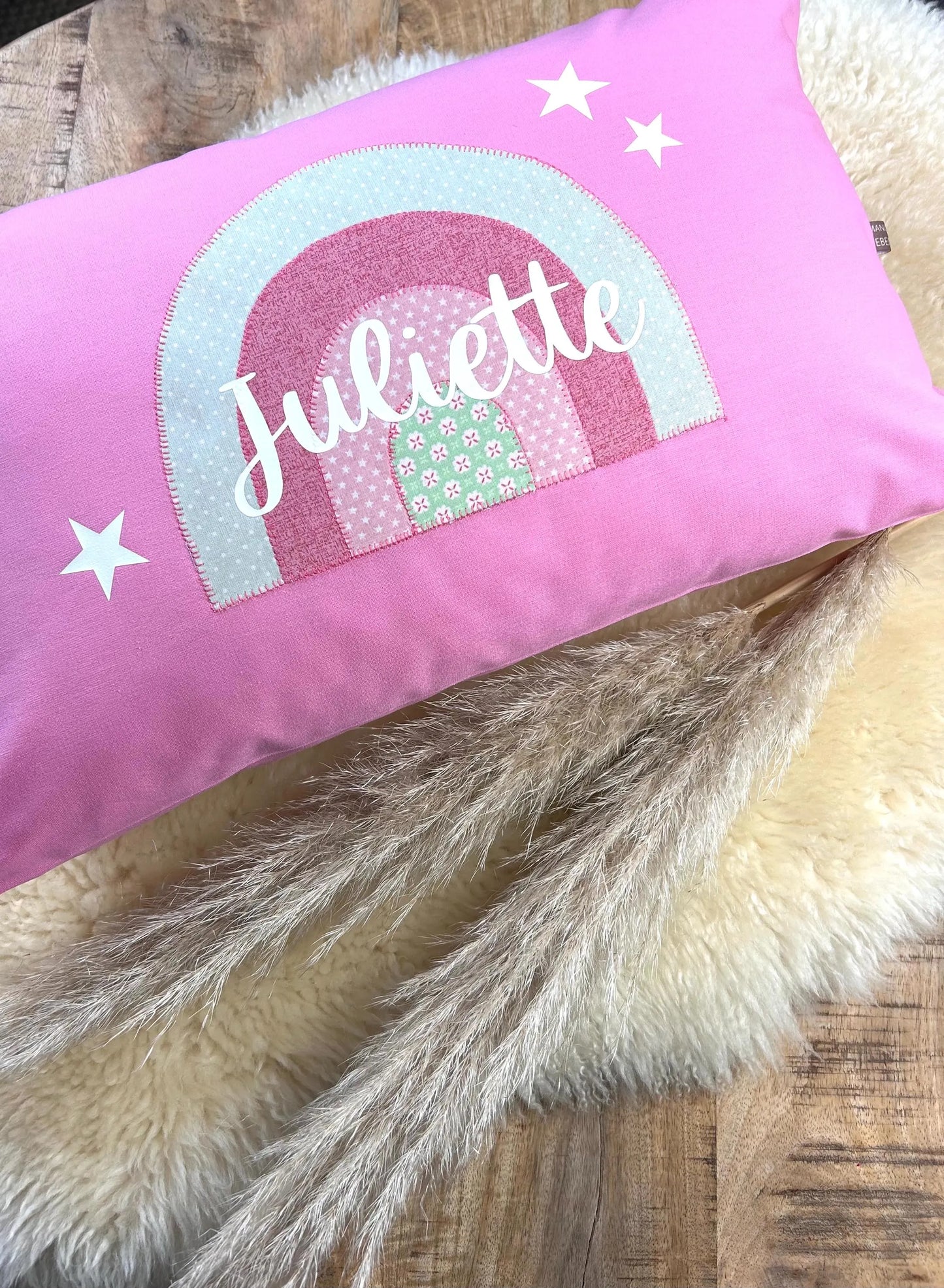 Namenskissen Regenbogen personalisiert pink