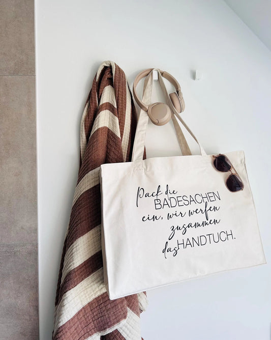Strandtasche Pack die Badesachen ein…